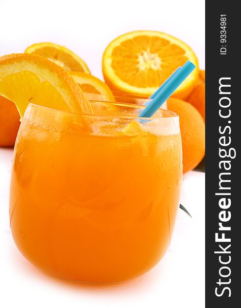 Orange and orange juice in a glass