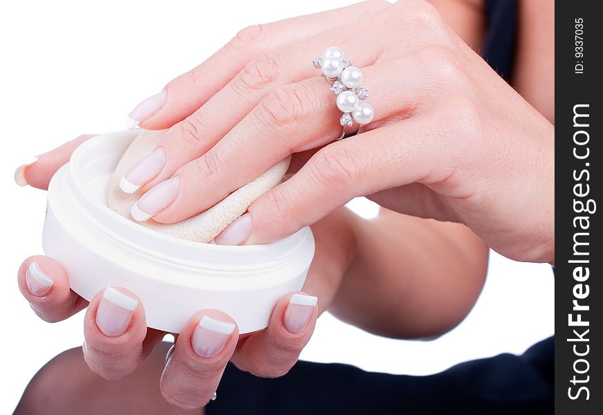 Closeup of woman is preparing to apply foundation