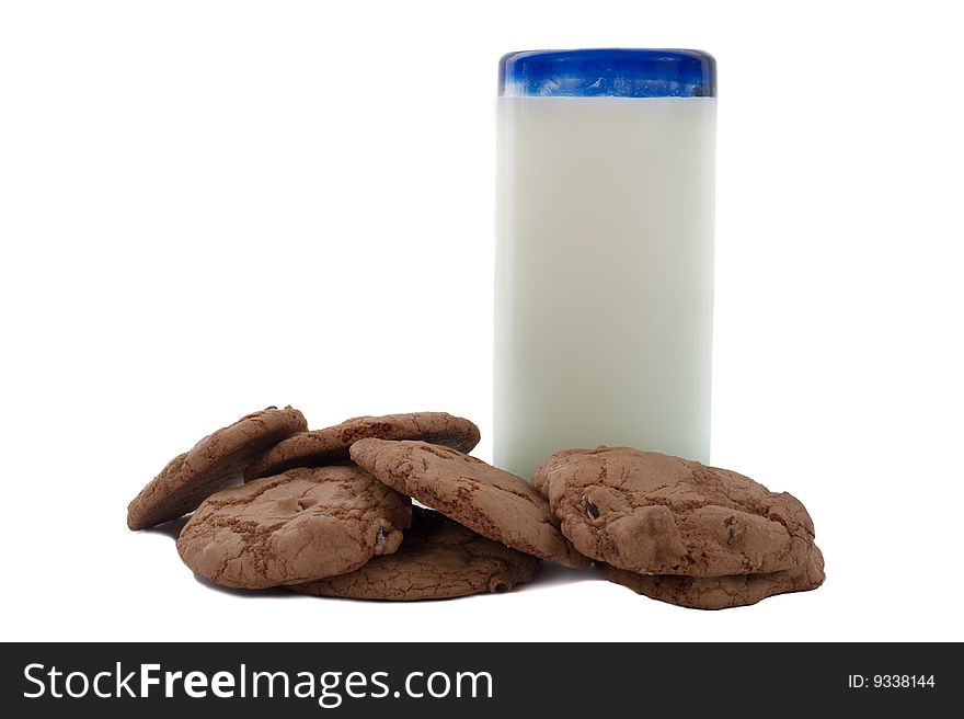 Stack of chocolate chip cookes and a glass of milk. Stack of chocolate chip cookes and a glass of milk.