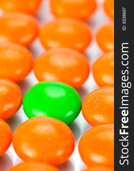 Chocolate coated candy isolated against a white background. Chocolate coated candy isolated against a white background