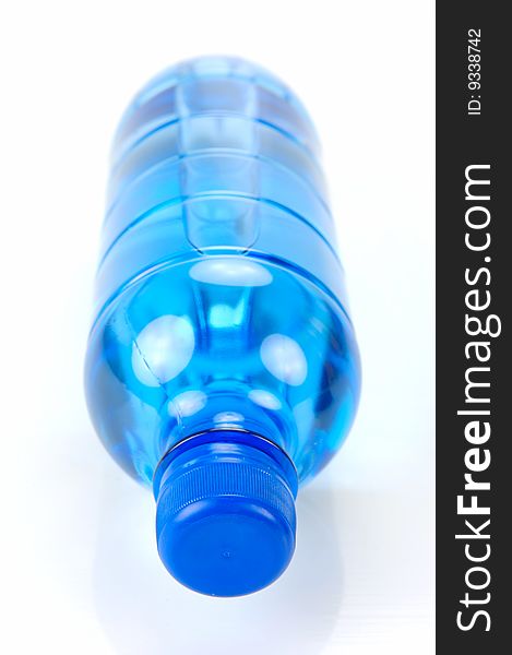 Bottle drinking water isolated against a white background. Bottle drinking water isolated against a white background