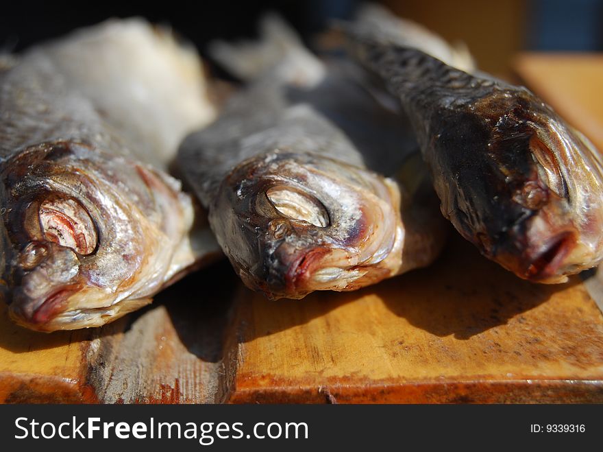 Three dried fishes