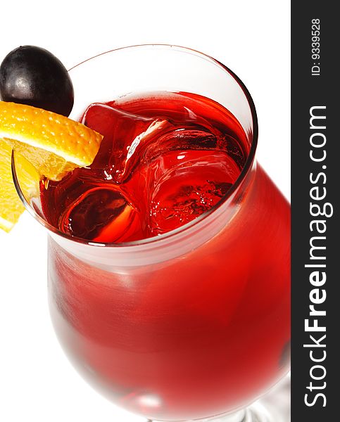 Red Alcoholic Cocktail with Orange Slice and Grape. Red Alcoholic Cocktail with Orange Slice and Grape