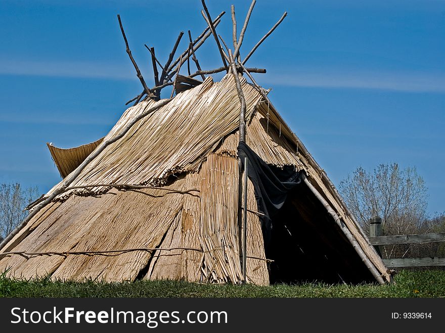 Indian tepee made with bark and branches. Indian tepee made with bark and branches.