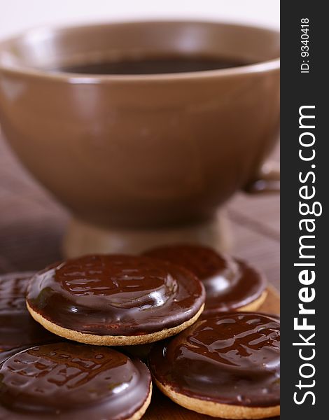 Sweet brown cookies with coffee. Sweet brown cookies with coffee