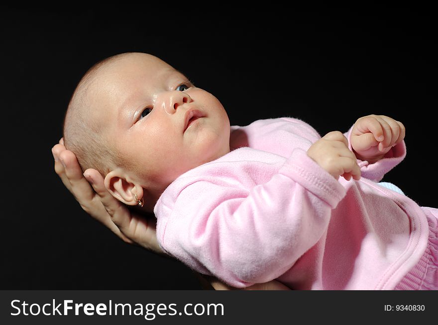 Little baby in dad's hands