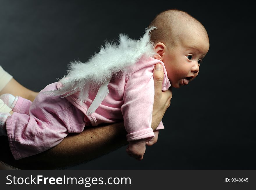 Little baby in dad's hands