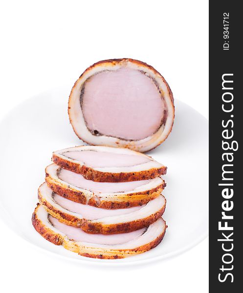 Delicious baked ham with bacon isolated over white. Bon appetit!. Delicious baked ham with bacon isolated over white. Bon appetit!