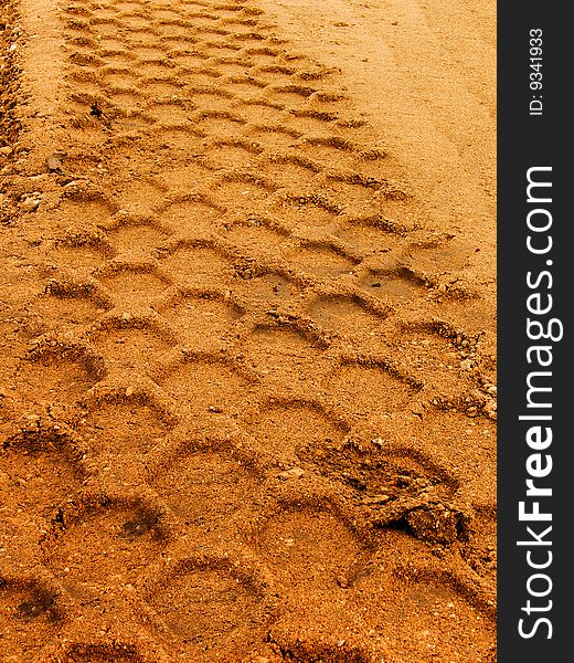 Print of a protector of a wheel on road Ð°bstract background