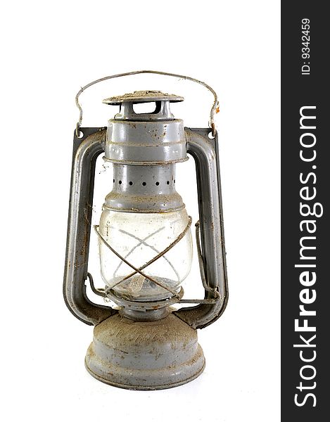 Vintage petroleum lamp isolated on a white background. Vintage petroleum lamp isolated on a white background