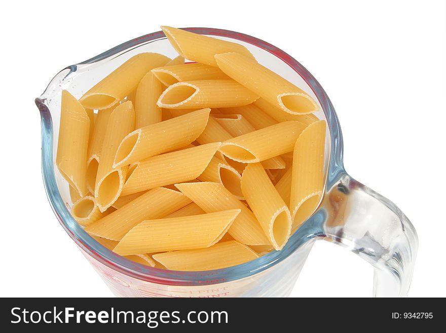 Macaroni in a glass jar on a white background. Macaroni in a glass jar on a white background
