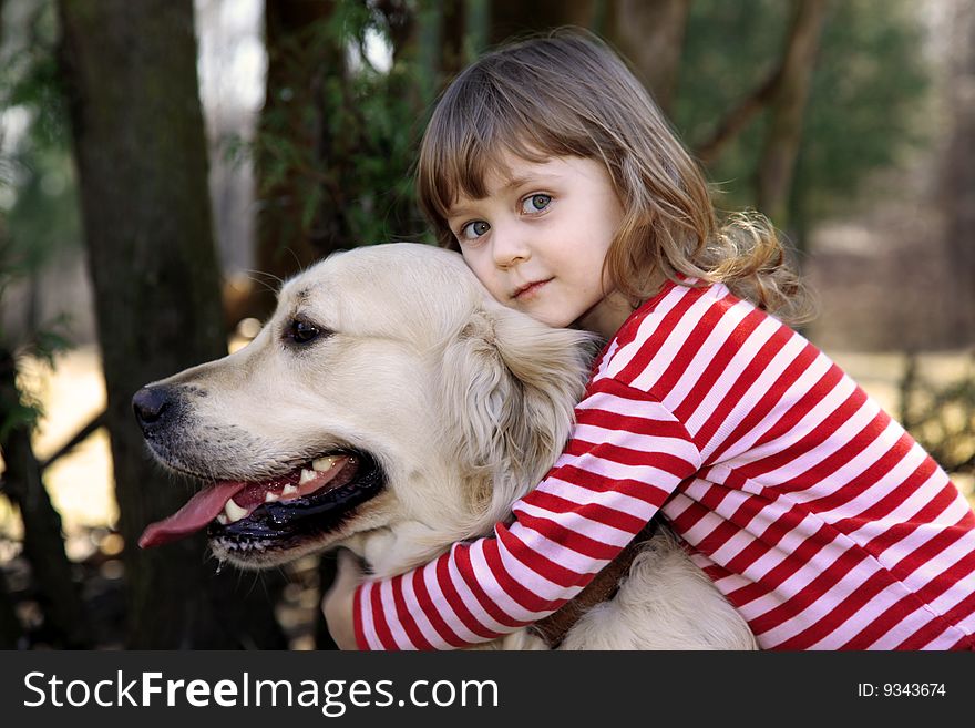 Little girl with big retriever outdoor. Little girl with big retriever outdoor