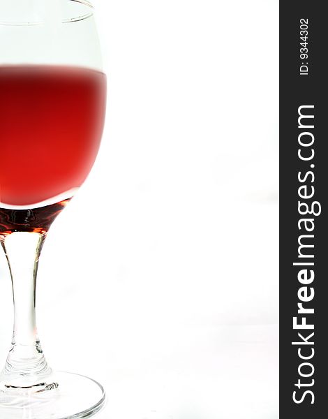 Glass of red wine on white. Glass of red wine on white