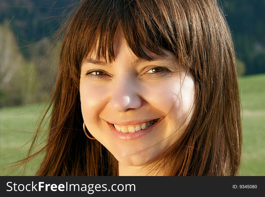 Portrait shot of a beautiful caucasian woman. Happy and smiling. Portrait shot of a beautiful caucasian woman. Happy and smiling