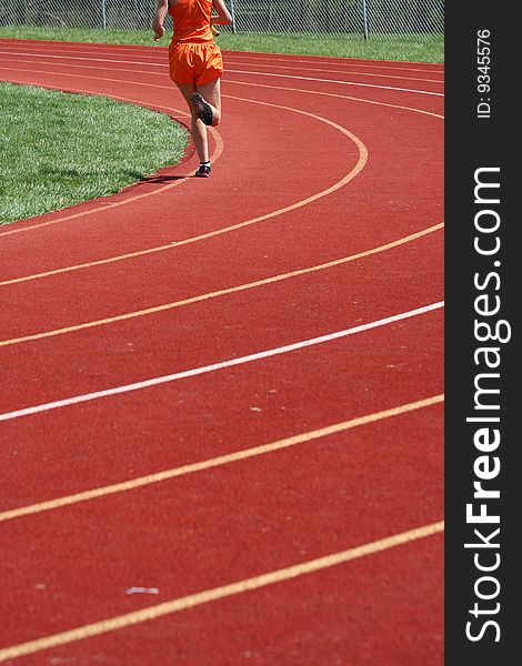 Runners running in a track race. Runners running in a track race