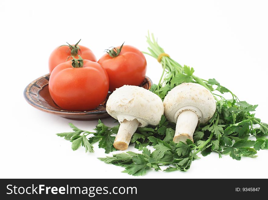 Group of tomatoes, parsley and mushrooms. Group of tomatoes, parsley and mushrooms