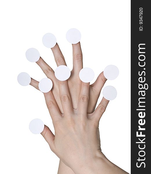 Hands with round paper on fingers