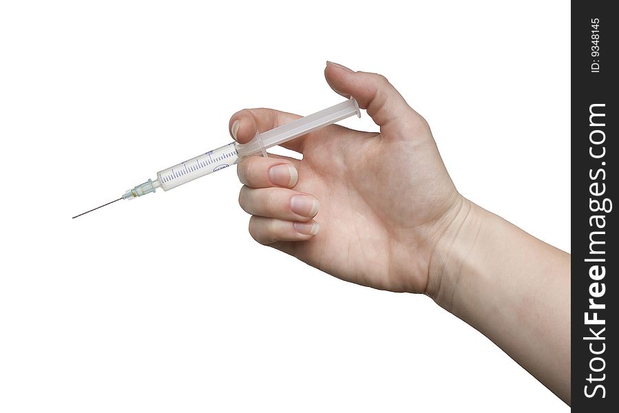 Woman hand with a syringe