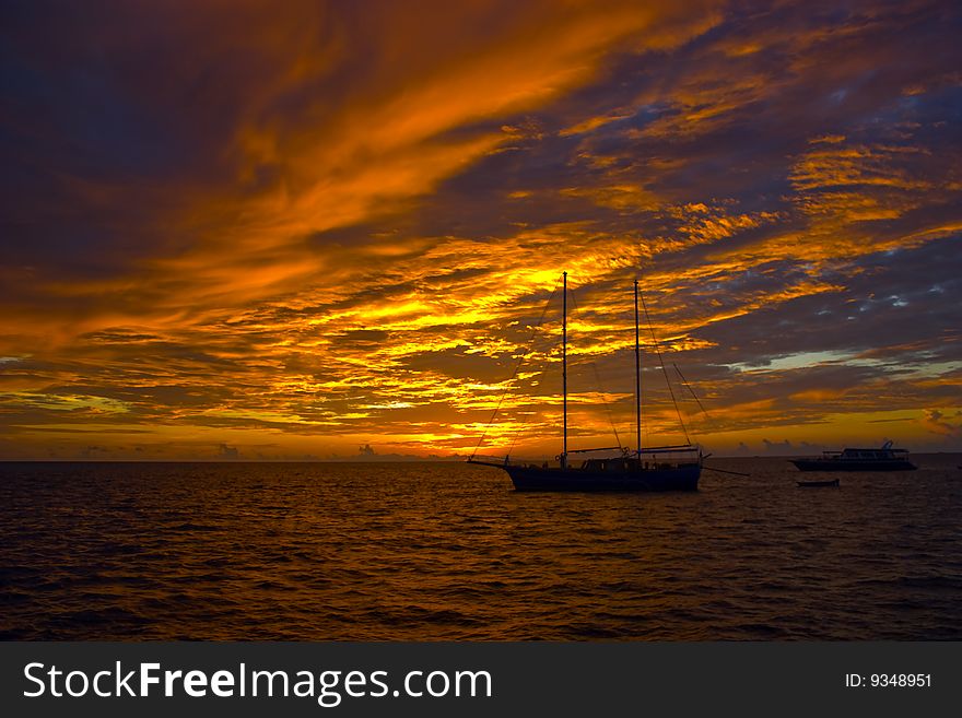 Golden sunset with the ships