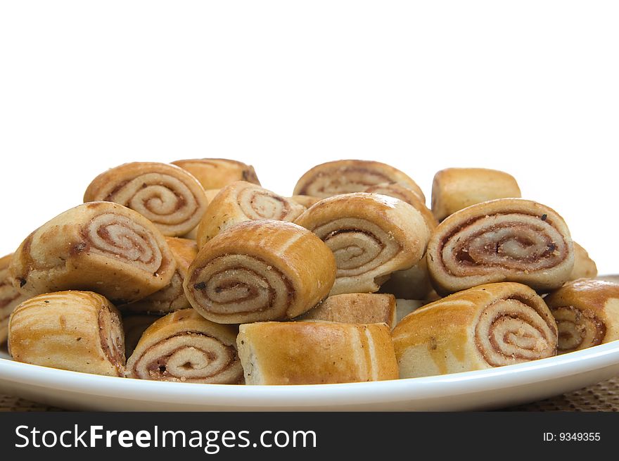 Cookies, slices on a white plate