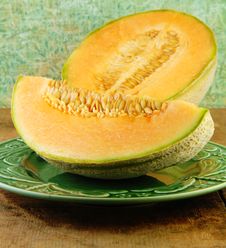 Sliced Cantaloupe On A Wooden Table Stock Images Sliced Cantaloupe On A Wooden Table Stock Images