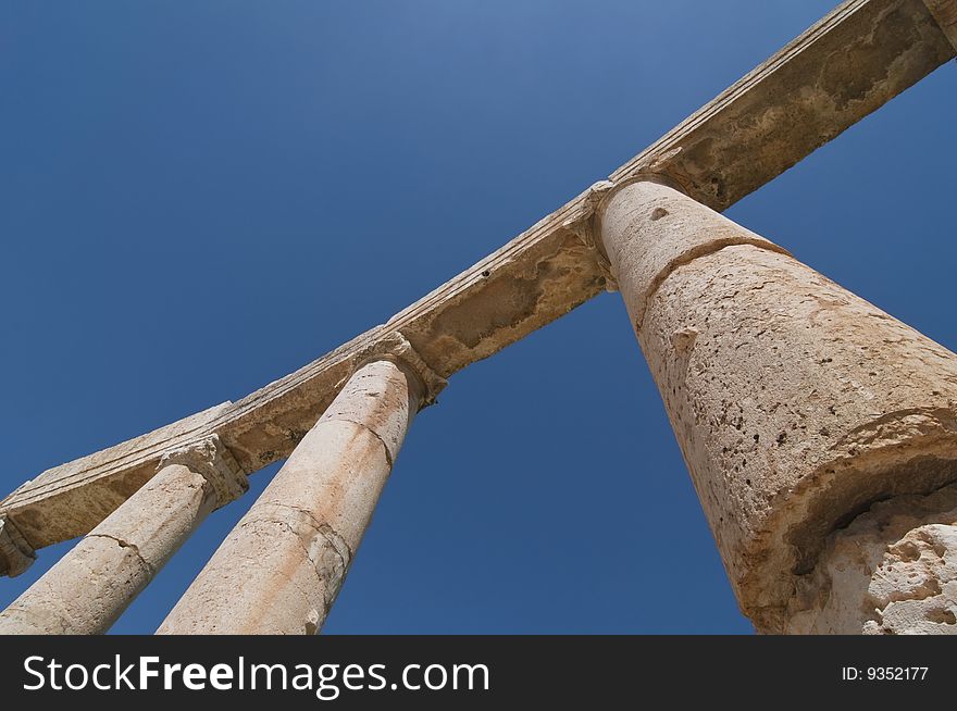 Ancient columns with blue sky