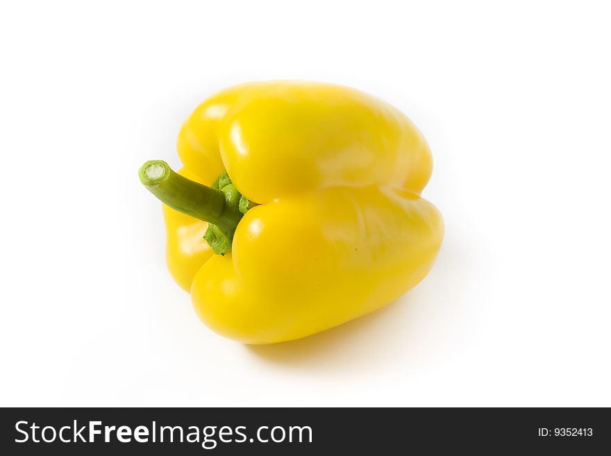 Yellow pepper on a white background. A photo close up.