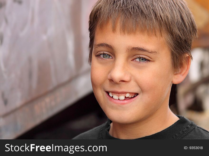 Boy Smiling Against Colorful Background