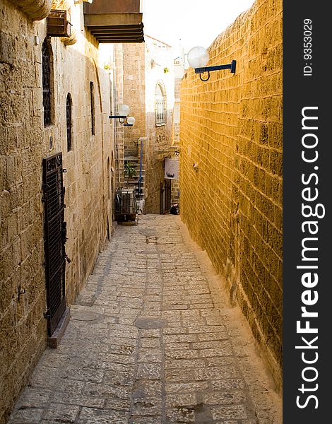 A street in the Old Jaffa, Tel-Aviv, Israel. Jaffa became a bohemian area hosting many talented painters, sculptors and craftspeople. A street in the Old Jaffa, Tel-Aviv, Israel. Jaffa became a bohemian area hosting many talented painters, sculptors and craftspeople.