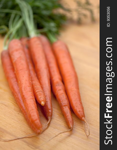 Bunches Of Fresh Carrots For Sale At A Market