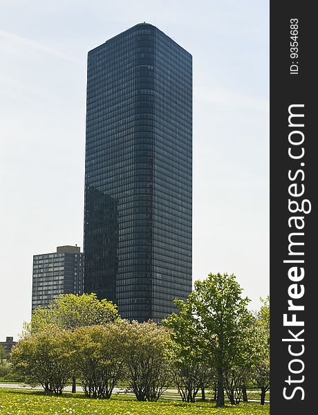 An apartment building north of downtown Chicago stands high with a good view of Lake Michigan and the skyline. An apartment building north of downtown Chicago stands high with a good view of Lake Michigan and the skyline.