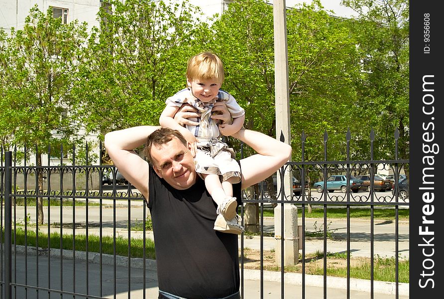 The father with the son on walk. The father with the son on walk