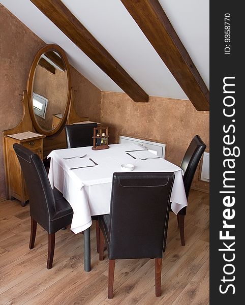 Table with cutlery, plaits and glasses in Restaurant. Table with cutlery, plaits and glasses in Restaurant