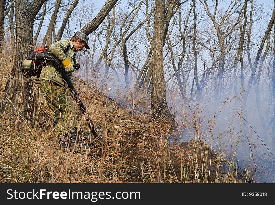 A suppression of forest fire. Early spring. A suppression of forest fire. Early spring.