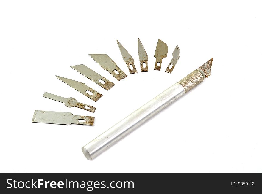 Rusty scalpel set isolated on a white background. Rusty scalpel set isolated on a white background