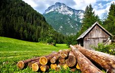 Free Lumber On Field At Mountain Cabin Stock Images - 93559214