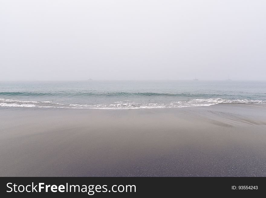 Ocean Waves On Beach Side