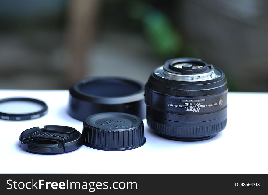 Camera Lens Set on Table