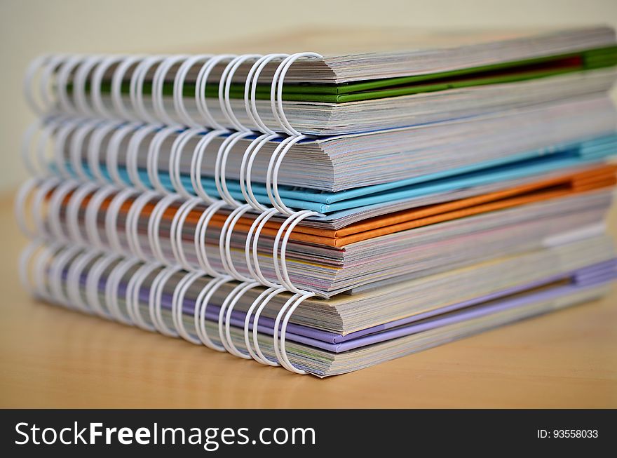 Stack Of Coil Bound Books