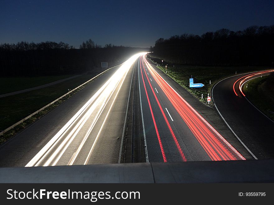 A long exposure of car lights on a highway. A long exposure of car lights on a highway.