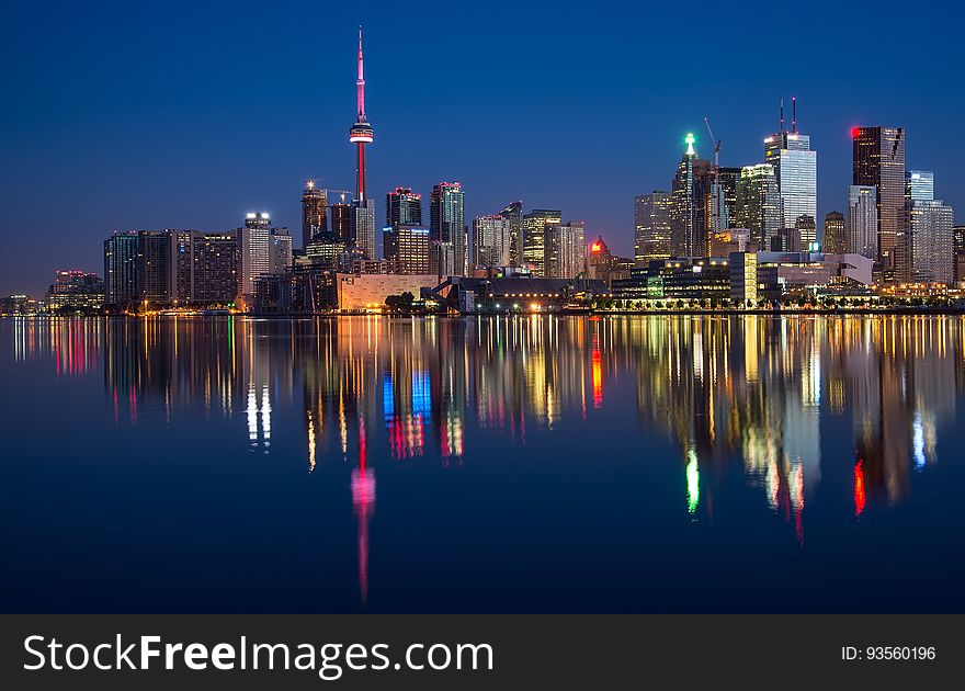 A night view of the Toronto city skyline with CN Tower. A night view of the Toronto city skyline with CN Tower.
