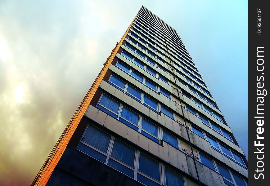 An angled view of a high rise building.