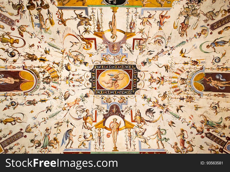 Alegorical and mythological creatures and symbols are painted on the ceiling of Uffizi Gallery corridors. Alegorical and mythological creatures and symbols are painted on the ceiling of Uffizi Gallery corridors.