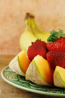 Sliced Cantaloupe And Strawberries Stock Photo Sliced Cantaloupe And Strawberries Stock Photo
