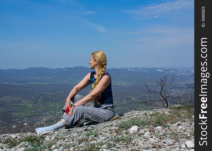 Woman and mountains  in spring