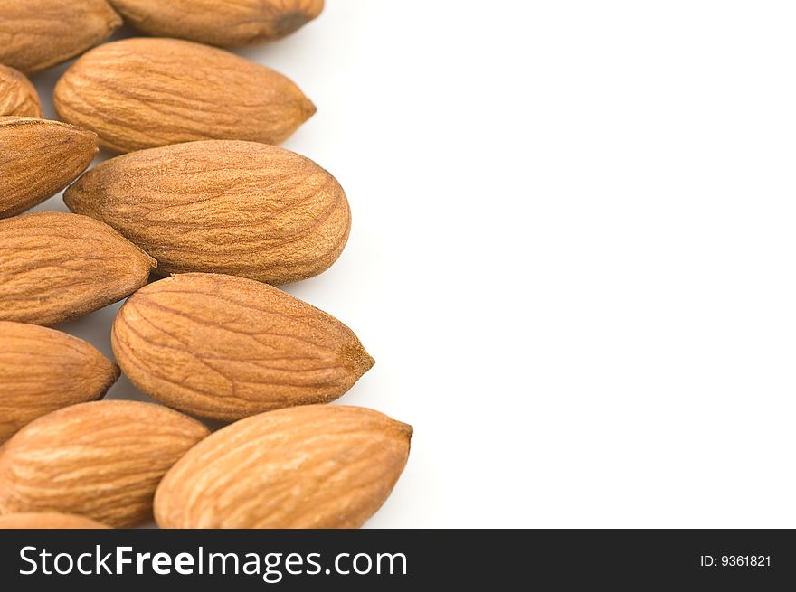 Almond kernels  in white background, close up.