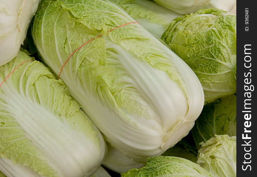 Close up on some lettuce for sale in a street market.