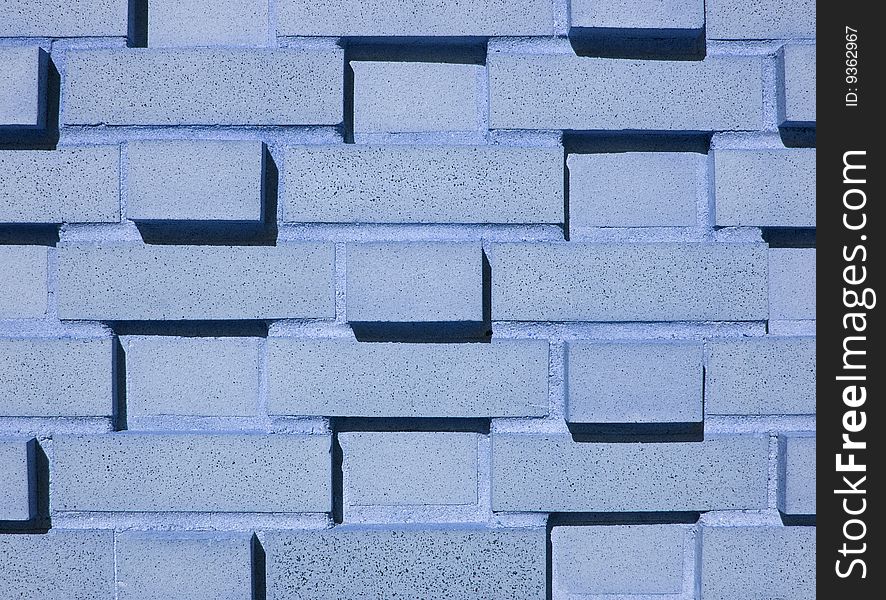 Multi-Layered Blue Brick Wall