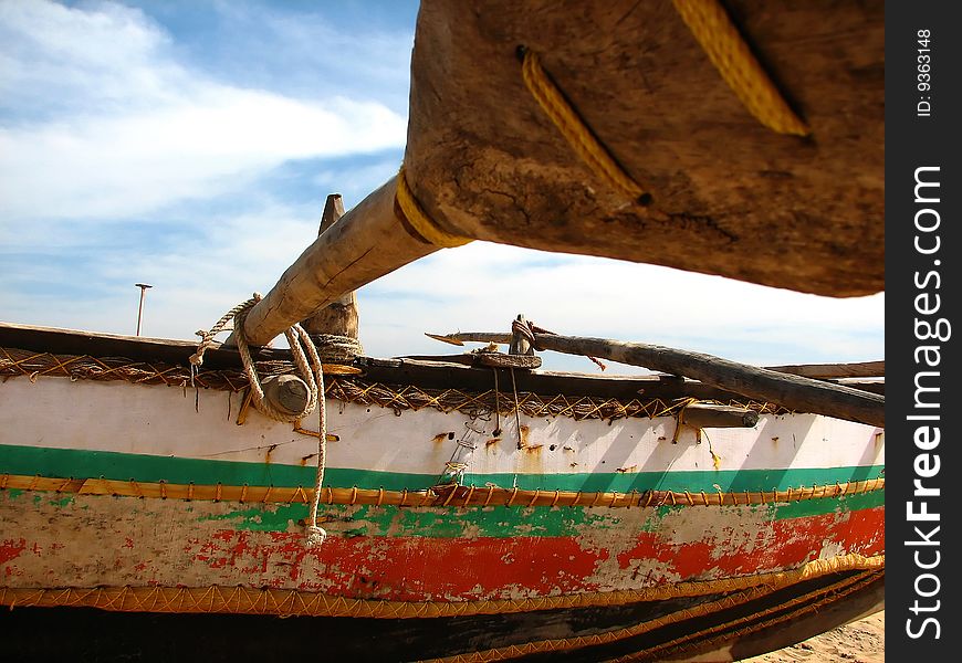 Indian old colorful boat lying on the beach. Indian old colorful boat lying on the beach