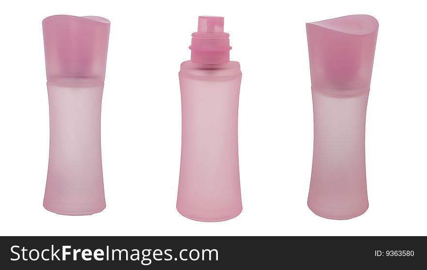 Isolated pink bottle of perfume